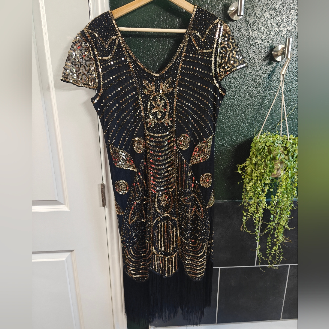 Elegant Black And Gold Embellished Dress